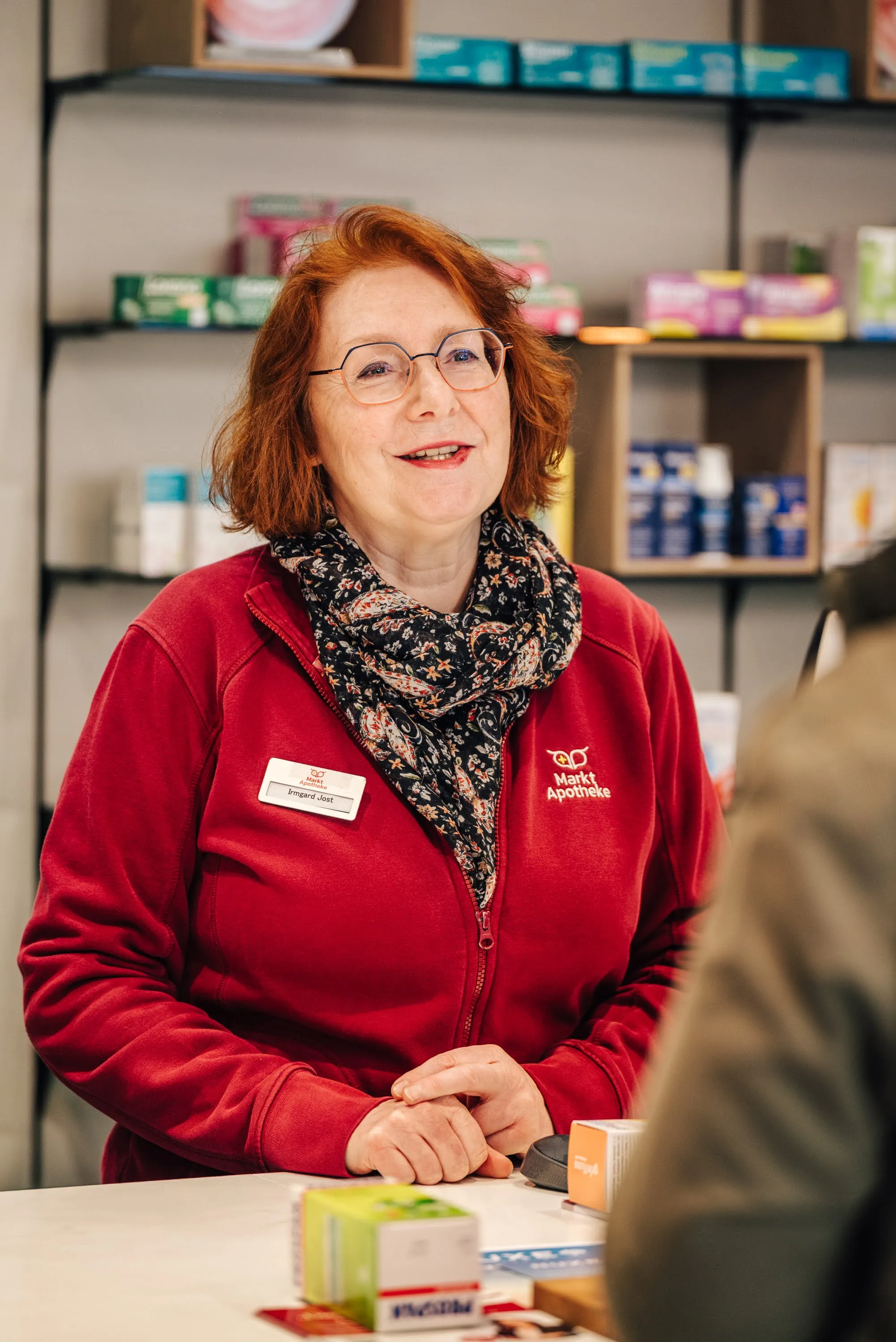 Mitarbeiterin im Beratungsgespräch